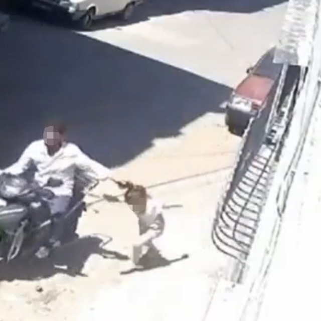 Küçük kızını darbedip motosikletle sürükleyen baba tutuklandı