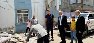 Başkan Hallaç, yangın mağduru aileyi yalnız bırakmadı