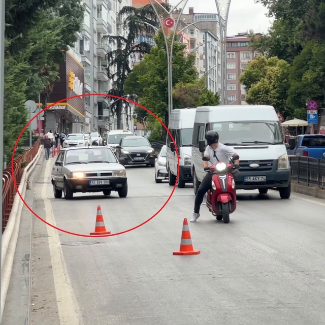 Trafik denetimini görünce anayolda geri geri kaçtı, motorize polis yakaladı