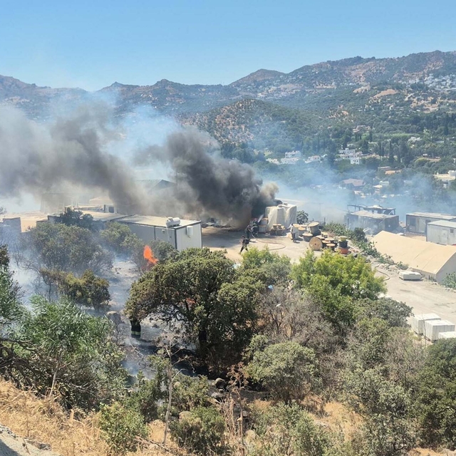 Bodrum'da konteynerde çıkan yangın makilik alana sıçradı