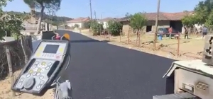Yenice'de köy yollarında sıcak asfalt dökme çalışmaları hız kesmeden devam...