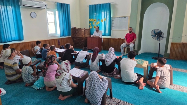 Kuyucak'ta Yaz Kur'an Kursu öğrencilerine rehberlik seminerleri