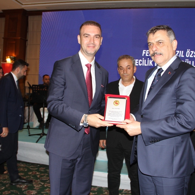 Aras Elektrik'e teşekkür plaketi