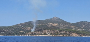 Kaş'ta makilik alanda çıkan yangın söndürüldü