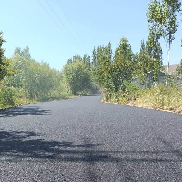 Kağızman'da köy yollarında asfalt seferberliği: 7 kilometrelik yol yenileni...