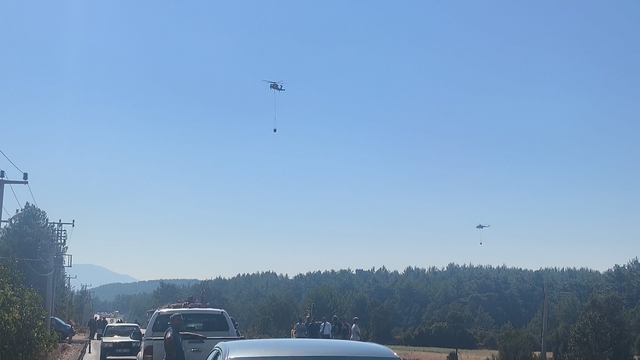 Muğla'daki yangına 7 uçak, 15 helikopterle müdahale sürüyor