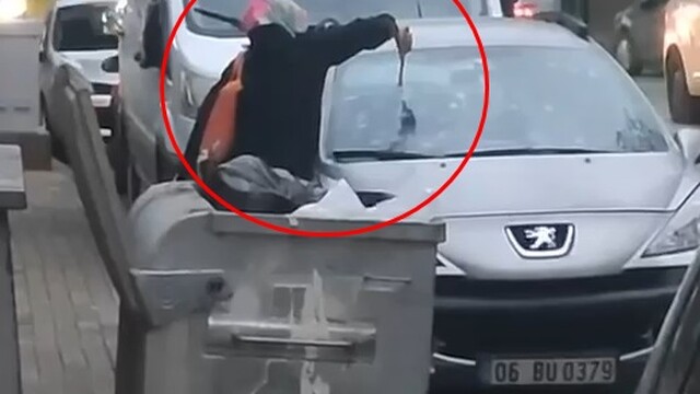 Tartıştığı kocasının otomobiline çekiçle zarar verdi